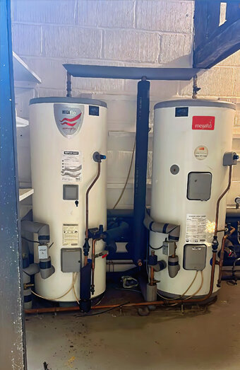 https://coogeehotwater.com.au/uploads/2025/06/electric-hot-water-system-10198.jpg