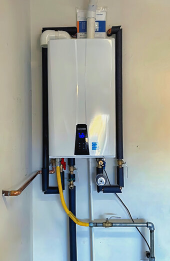 https://coogeehotwater.com.au/uploads/2025/06/instant-hot-water-systems-63860.jpg