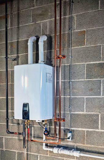 https://coogeehotwater.com.au/uploads/2025/06/instant-hot-water-systems-83505.jpg